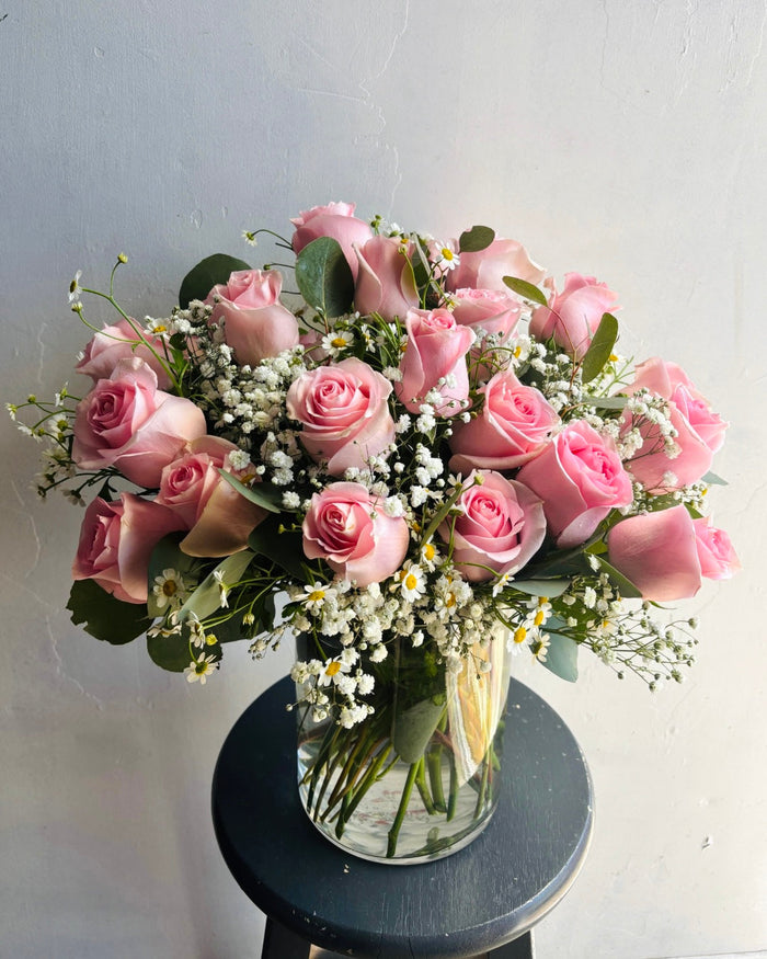 Pink roses with baby's breath